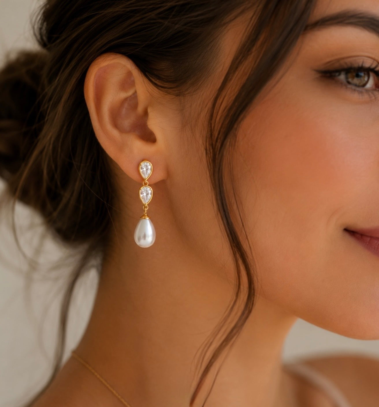 Wedding drop earrings with natural freshwater pearls and cubic zirconia.